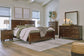 Danabrin King Panel Bed with Mirrored Dresser, Chest and Nightstand